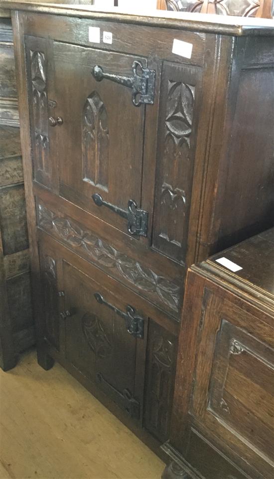 1920s oak Tudor style cupboard, wrought iron hinge mounted doors